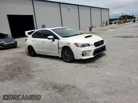 ✅ 2018 Subaru WRX STI Limited • VIN: JF1VA2W69J9820946 • Lot: 65944855. Listed on Copart with 93,829 mi. Free auction sales archive from the USA and detailed vehicle history report at DreamBid. Image 13.