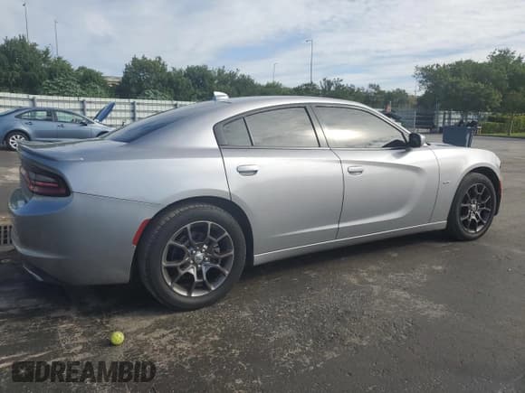 ✅ 2018 Dodge Charger GT • VIN: 2C3CDXJG2JH201437 • Lot: 90813545. Wystawiony na Copart z przebiegiem 143 266 mil. Bezpłatny archiwum sprzedaży aukcyjnych z USA i szczegółowy raport historii pojazdu na DreamBid. Zdjęcie 3.