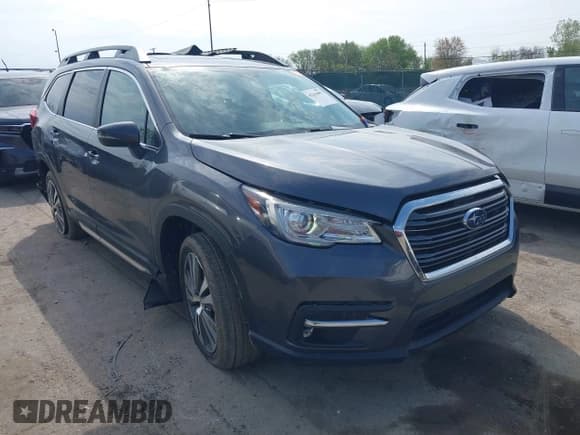 ✅ 2020 Subaru Ascent Limited • VIN: 4S4WMAPD6L3475132 • Lot: 42161897. Listed on IAAI with 73,074 mi. Free auction sales archive from the USA and detailed vehicle history report at DreamBid. Image 1.
