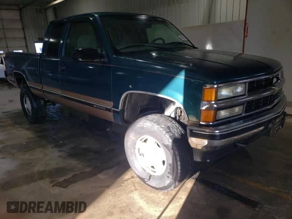 1998 Chevrolet Silverado 1500 with VIN 1GCEK19RXWE115952, listed as a Copart auction lot 87422535 with 248,499 mi miles and Salvage title. Bid and sale history available at DreamBid. Image 4.