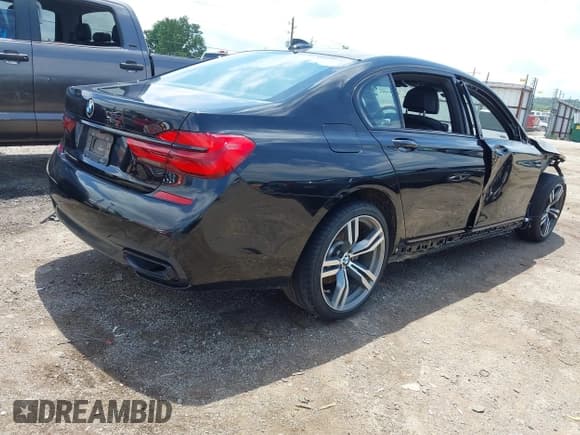 ✅ 2019 BMW 7 Series 740i • VIN: WBA7E2C5XKB217756 • Lot: 42509802. Listed on IAAI with 75,667 mi. Free auction sales archive from the USA and detailed vehicle history report at DreamBid. Image 4.