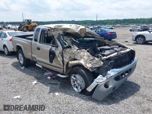 ✅ 2004 Dodge Dakota SLT • VIN: 1D7HG42N74S688982 • Lot: 42754344. Listed on IAAI with 69,540 mi. Free auction sales archive from the USA and detailed vehicle history report at DreamBid. Image 6.