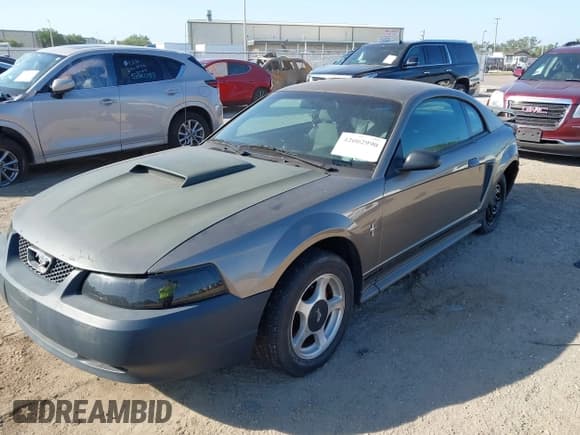 ✅ 2001 Ford Mustang Standard • VIN: 1FAFP40461F264327 • Лот: 42002990. Опубликован ранее на IAAI с пробегом 316 107 миль. Бесплатный доступ к архиву аукционных продаж из США и подробный отчёт об истории автомобиля на DreamBid. Изображение 16.