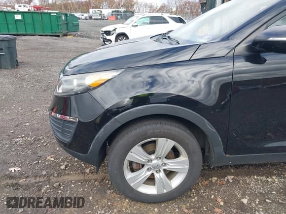 ✅ 2012 Kia Sportage LX • VIN: KNDPB3A2XC7215438 • Lot: 43578860. Listed on IAAI with 116,723 mi. Free auction sales archive from the USA and detailed vehicle history report at DreamBid. Image 13.