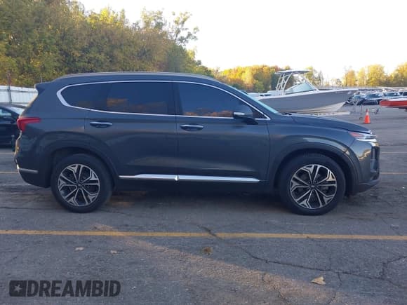 ✅ 2019 Hyundai Santa Fe Limited • VIN: 5NMS5CAA2KH075238 • Лот: 43467715. Опубликован ранее на IAAI с пробегом 125 796 миль. Бесплатный доступ к архиву аукционных продаж из США и подробный отчёт об истории автомобиля на DreamBid. Изображение 13.