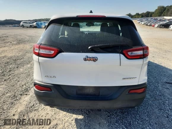 ✅ 2016 Jeep Cherokee Sport • VIN: 1C4PJMABXGW293271 • Лот: 82151835. Опубликован ранее на Copart с пробегом 117 778 миль. Бесплатный доступ к архиву аукционных продаж из США и подробный отчёт об истории автомобиля на DreamBid. Изображение 6.