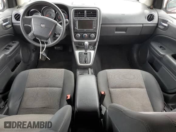 ✅ 2012 Dodge Caliber SXT • VIN: 1C3CDWDA4CD527743 • Лот: 56854505. Опубликован ранее на Copart с пробегом 183 216 миль. Бесплатный доступ к архиву аукционных продаж из США и подробный отчёт об истории автомобиля на DreamBid. Изображение 8.