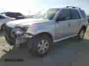 2011 Mercury Mariner with VIN 4M2CN8B78BKJ02364, listed as a Copart auction lot 80027665 with 141,319 mi miles and Salvage title. Bid and sale history available at DreamBid. Image 1.