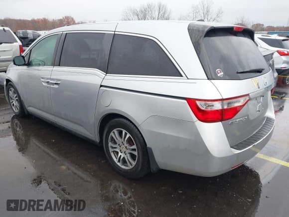 ✅ 2012 Honda Odyssey EX-L • VIN: 5FNRL5H61CB030022 • Lot: 43730404. Listed on IAAI with 153,349 mi. Free auction sales archive from the USA and detailed vehicle history report at DreamBid. Image 3.