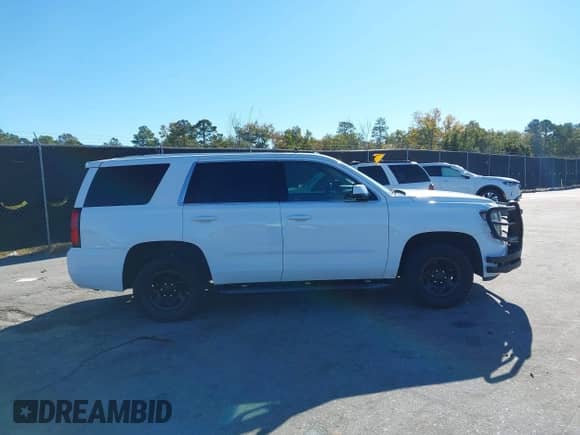 2018 Chevrolet Tahoe with VIN 1GNLCDKC7JR369185, listed as a IAAI auction lot 43595849 with 98,810 mi miles and . Bid and sale history available at DreamBid. Image 13.