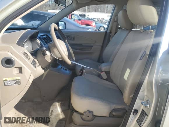 2009 Hyundai Tucson SE with VIN KM8JN72D19U970813, listed as a Copart auction lot 88469545 with 152,648 mi miles and Salvage title. Bid and sale history available at DreamBid. Image 7.