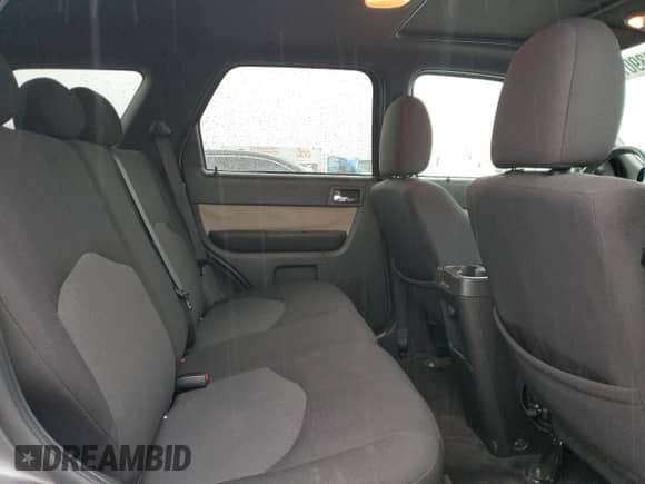 2009 Mercury Mariner z VIN 4M2CU81G39KJ17532, wystawiony jako Copart lot #43907455 z przebiegiem 214 212 mil mil oraz Szkoda całkowita • Salvage title. Historia ofert i sprzedaży dostępna na DreamBid. Obrazek 12.