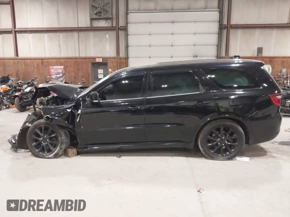 2017 Dodge Durango R/T with VIN 1C4SDJCT9HC945581, listed as a IAAI auction lot 43420044 with 143,365 mi miles and . Bid and sale history available at DreamBid. Image 14.