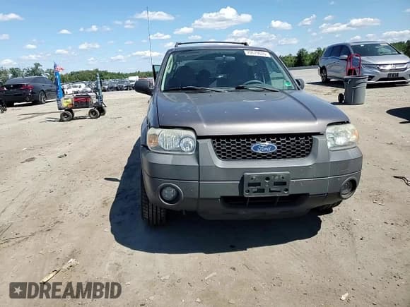 ✅ 2006 Ford Escape Hybrid • VIN: 1FMCU96H66KB01300 • Lot: 70679635. Wystawiony na Copart z przebiegiem 189 538 mil. Bezpłatny archiwum sprzedaży aukcyjnych z USA i szczegółowy raport historii pojazdu na DreamBid. Zdjęcie 14.