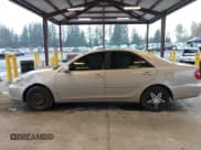 ✅ 2003 Toyota Camry XLE • VIN: 4T1BE30K13U740047 • Lot: 43628001. Listed on IAAI with 198,432 mi. Free auction sales archive from the USA and detailed vehicle history report at DreamBid. Image 14.