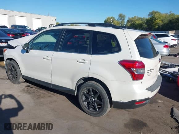 ✅ 2014 Subaru Forester Touring • VIN: JF2SJAMC2EH421759 • Лот: 43399760. Опубликован ранее на IAAI с пробегом 106 702 миль. Бесплатный доступ к архиву аукционных продаж из США и подробный отчёт об истории автомобиля на DreamBid. Изображение 3.