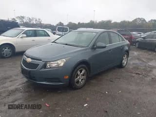✅ 2012 Chevrolet Cruze 1LT • VIN: 1G1PF5SC5C7363867 • Lot: 43579046. Listed on IAAI with 143,423 mi. Free auction sales archive from the USA and detailed vehicle history report at DreamBid. Image 2.