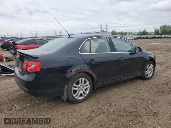 ✅ 2007 Volkswagen Jetta Wolfsburg Edition • VIN: 3VWEF81K27M058036 • Лот: 57813345. Опубликован ранее на Copart с пробегом 73 404 миль. Бесплатный доступ к архиву аукционных продаж из США и подробный отчёт об истории автомобиля на DreamBid. Изображение 3.