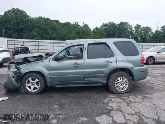 2006 Mercury Mariner Luxury with VIN 4M2YU57196KJ01063, listed as a IAAI auction lot 42907986 with Not provided miles and . Bid and sale history available at DreamBid. Image 14.