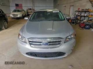 ✅ 2011 Ford Taurus SHO • VIN: 1FAHP2KT0BG118096 • Lot: 93745365. Listed on Copart with 147,532 mi. Free auction sales archive from the USA and detailed vehicle history report at DreamBid. Image 5.