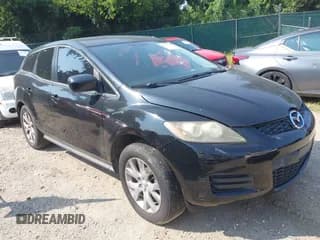 ✅ 2007 Mazda CX-7 Grand Touring • VIN: JM3ER293570133472 • Лот: 42914709. Опубликован ранее на IAAI с пробегом 131 330 миль. Бесплатный доступ к архиву аукционных продаж из США и подробный отчёт об истории автомобиля на DreamBid. Изображение 1.