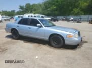 ✅ 2001 Ford Crown Victoria • VIN: 2FAFP73W61X190913 • Lot: 53063475. Listed on Copart with 151,527 mi. Free auction sales archive from the USA and detailed vehicle history report at DreamBid. Image 4.