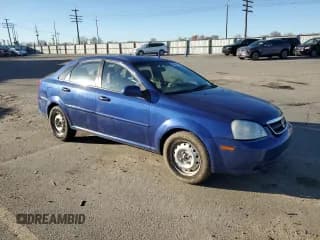 ✅ 2007 Suzuki Forenza • VIN: KL5JD56Z57K691056 • Лот: 50425815. Опубликован ранее на Copart с пробегом 114 168 миль. Бесплатный доступ к архиву аукционных продаж из США и подробный отчёт об истории автомобиля на DreamBid. Изображение 4.