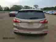 2018 Chevrolet Equinox Premier z VIN 3GNAXMEV5JL352725, wystawiony jako Copart lot #81042215 z przebiegiem 72 179 mil mil oraz Szkoda całkowita • Salvage title. Historia ofert i sprzedaży dostępna na DreamBid. Obrazek 6.