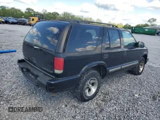 ✅ 2000 Chevrolet Blazer LS • VIN: 1GNCS13W3Y2297205 • Lot: 52946885. Wystawiony na Copart z przebiegiem 204 232 mil. Bezpłatny archiwum sprzedaży aukcyjnych z USA i szczegółowy raport historii pojazdu na DreamBid. Zdjęcie 3.