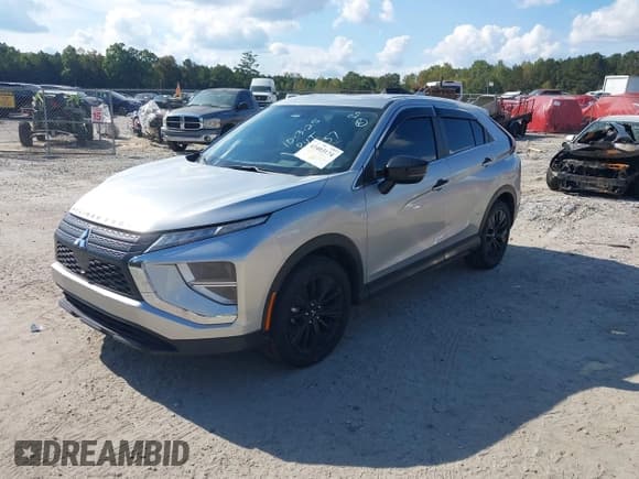 ✅ 2022 Mitsubishi Eclipse Cross LE • VIN: JA4ASVAA9NZ054557 • Лот: 43403174. Опубликован ранее на IAAI с пробегом 112 338 миль. Бесплатный доступ к архиву аукционных продаж из США и подробный отчёт об истории автомобиля на DreamBid. Изображение 2.