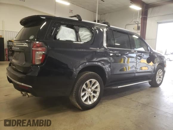 ✅ 2021 Chevrolet Suburban Premier • VIN: 1GNSCFKD2MR318276 • Lot: 37848743. Wystawiony na Copart z przebiegiem 33 165 mil. Bezpłatny archiwum sprzedaży aukcyjnych z USA i szczegółowy raport historii pojazdu na DreamBid. Zdjęcie 3.