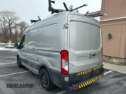 ✅ 2016 Ford Transit Cargo • VIN: 1FTYE1CM2GKA19236 • Lot: 45160575. Listed on Copart with 155,209 mi. Free auction sales archive from the USA and detailed vehicle history report at DreamBid. Image 2.