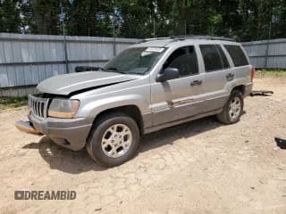 ✅ 2001 Jeep Grand Cherokee Laredo • VIN: 1J4GX48S41C710312 • Lot: 71602705. Listed on Copart with 190,339 mi. Free auction sales archive from the USA and detailed vehicle history report at DreamBid. Image 1.