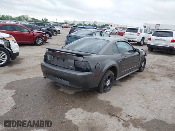 ✅ 2003 Ford Mustang Standard • VIN: 1FAFP40473F383331 • Lot: 42128521. Listed on IAAI with 226,165 mi. Free auction sales archive from the USA and detailed vehicle history report at DreamBid. Image 4.