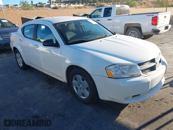 ✅ 2010 Dodge Avenger SXT • VIN: 1B3CC4FB7AN131856 • Lot: 43576959. Listed on IAAI with 132,725 mi. Free auction sales archive from the USA and detailed vehicle history report at DreamBid. Image 1.