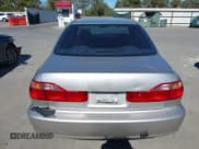 ✅ 1999 Honda Accord EX • VIN: JHMCG6670XC033488 • Lot: 43592368. Wystawiony na IAAI z przebiegiem 152 453 mil. Bezpłatny archiwum sprzedaży aukcyjnych z USA i szczegółowy raport historii pojazdu na DreamBid. Zdjęcie 17.