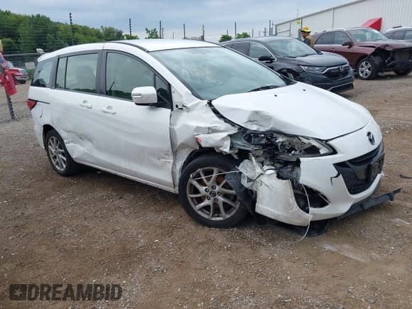✅ 2013 Mazda 5 Touring • VIN: JM1CW2CL2D0153269 • Lot: 42865405. Listed on IAAI with Not provided. Free auction sales archive from the USA and detailed vehicle history report at DreamBid. Image 1.