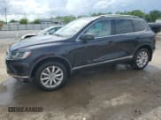 ✅ 2016 Volkswagen Touareg Sport • VIN: WVGEF9BP3GD008823 • Lot: 56838985. Listed on Copart with 49,612 mi. Free auction sales archive from the USA and detailed vehicle history report at DreamBid. Image 1.