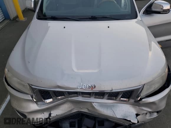 ✅ 2012 Jeep Grand Cherokee Overland • VIN: 1C4RJFCT8CC332736 • Lot: 87726165. Listed on Copart with 151,711 mi. Free auction sales archive from the USA and detailed vehicle history report at DreamBid. Image 12.