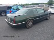 ✅ 2001 Cadillac Eldorado ESC • VIN: 1G6EL12Y01B107760 • Lot: 42797121. Wystawiony na IAAI z przebiegiem 86 446 mil. Bezpłatny archiwum sprzedaży aukcyjnych z USA i szczegółowy raport historii pojazdu na DreamBid. Zdjęcie 4.