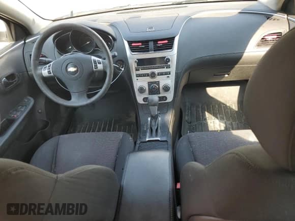 2012 Chevrolet Malibu 1LT z VIN 1G1ZC5E07CF249880, wystawiony jako Copart lot #65607104 z przebiegiem 119 888 mil mil oraz Szkoda całkowita • Salvage title. Historia ofert i sprzedaży dostępna na DreamBid. Obrazek 8.