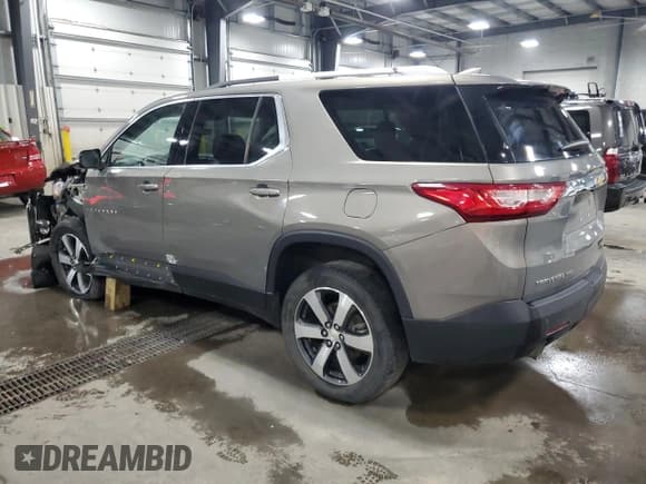 ✅ 2018 Chevrolet Traverse LT • VIN: 1GNEVHKW7JJ112143 • Lot: 81086695. Listed on Copart with 199,471 mi. Free auction sales archive from the USA and detailed vehicle history report at DreamBid. Image 2.
