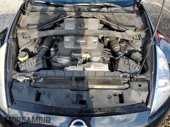 ✅ 2009 Nissan 370Z Touring • VIN: JN1AZ44E49M405908 • Лот: 74594204. Опубликован ранее на Copart с пробегом Не указан. Бесплатный доступ к архиву аукционных продаж из США и подробный отчёт об истории автомобиля на DreamBid. Изображение 11.