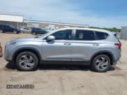 ✅ 2022 Hyundai Santa Fe SE • VIN: 5NMS14AJ7NH393037 • Lot: 42276818. Listed on IAAI with 77,656 mi. Free auction sales archive from the USA and detailed vehicle history report at DreamBid. Image 15.