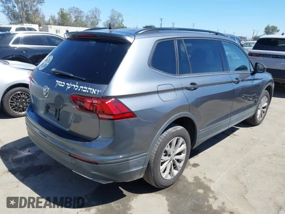 ✅ 2020 Volkswagen Tiguan S • VIN: 3VV1B7AXXLM033223 • Lot: 42906678. Wystawiony na IAAI z przebiegiem 36 927 mil. Bezpłatny archiwum sprzedaży aukcyjnych z USA i szczegółowy raport historii pojazdu na DreamBid. Zdjęcie 4.