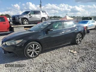 ✅ 2016 Nissan Maxima SL • VIN: 1N4AA6AP4GC394052 • Lot: 86093175. Listed on Copart with 236,292 mi. Free auction sales archive from the USA and detailed vehicle history report at DreamBid. Image 1.