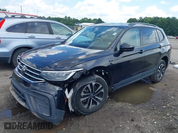 ✅ 2023 Volkswagen Tiguan S • VIN: 3VVRB7AX0PM047141 • Lot: 42524650. Listed on IAAI with 41,765 mi. Free auction sales archive from the USA and detailed vehicle history report at DreamBid. Image 2.