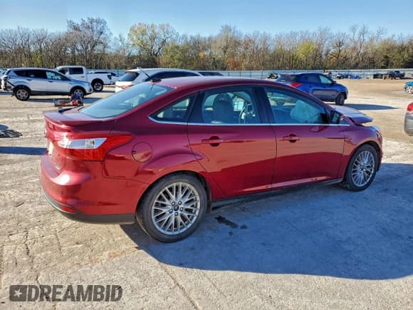 ✅ 2014 Ford Focus Titanium • VIN: 1FADP3J23EL259186 • Lot: 93946175. Listed on Copart with 173,444 mi. Free auction sales archive from the USA and detailed vehicle history report at DreamBid. Image 3.
