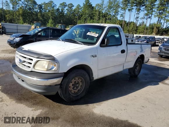 ✅ 1999 Ford F-150 • VIN: 1FTZF1721XNA42001 • Lot: 89681395. Wystawiony na Copart z przebiegiem 265 349 mil. Bezpłatny archiwum sprzedaży aukcyjnych z USA i szczegółowy raport historii pojazdu na DreamBid. Zdjęcie 1.