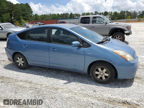 ✅ 2007 Toyota Prius • VIN: JTDKB20UX77690407 • Lot: 60980445. Listed on Copart with 108,686 mi. Free auction sales archive from the USA and detailed vehicle history report at DreamBid. Image 4.